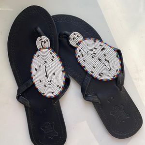 Never worn hand made, beaded African sandals.